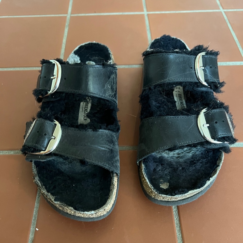 WELL-LOVED BLACK LEATHER & SHEARLING BIRKENSTOCKS